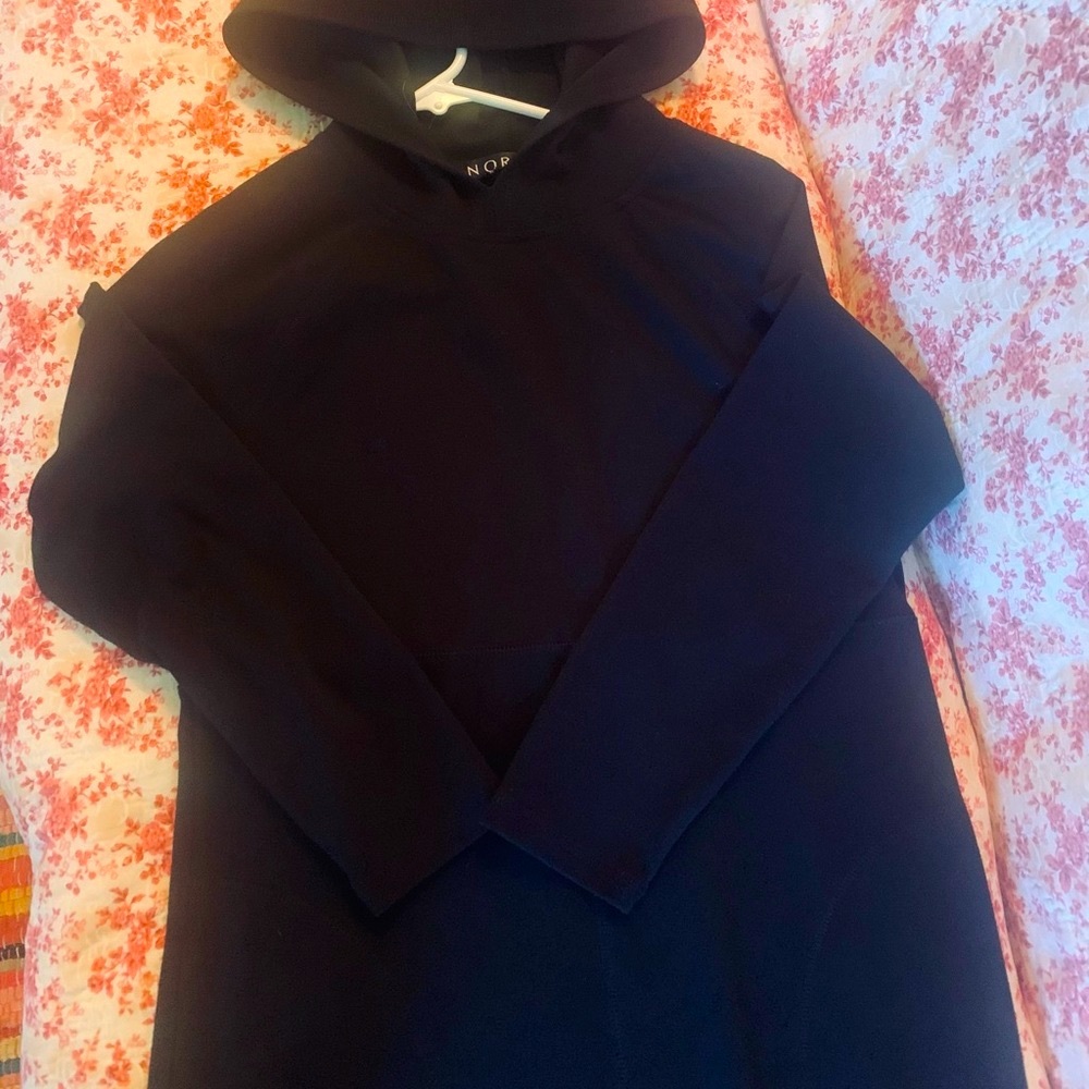 Women Adorable Black Hoodie Dress with long sleeves and side pockets.